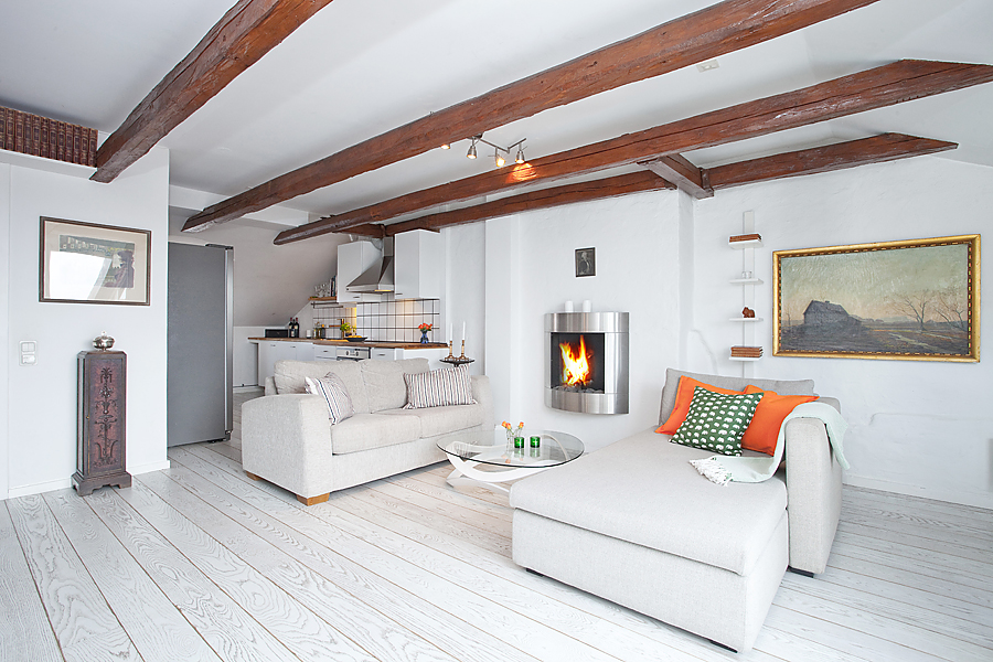 vigas en el techo mini pisos estilo nordico sueco distribución abierta diáfana decoración áticos blog decoración nórdica aticos con terraza atico sueco Ático sin paredes 