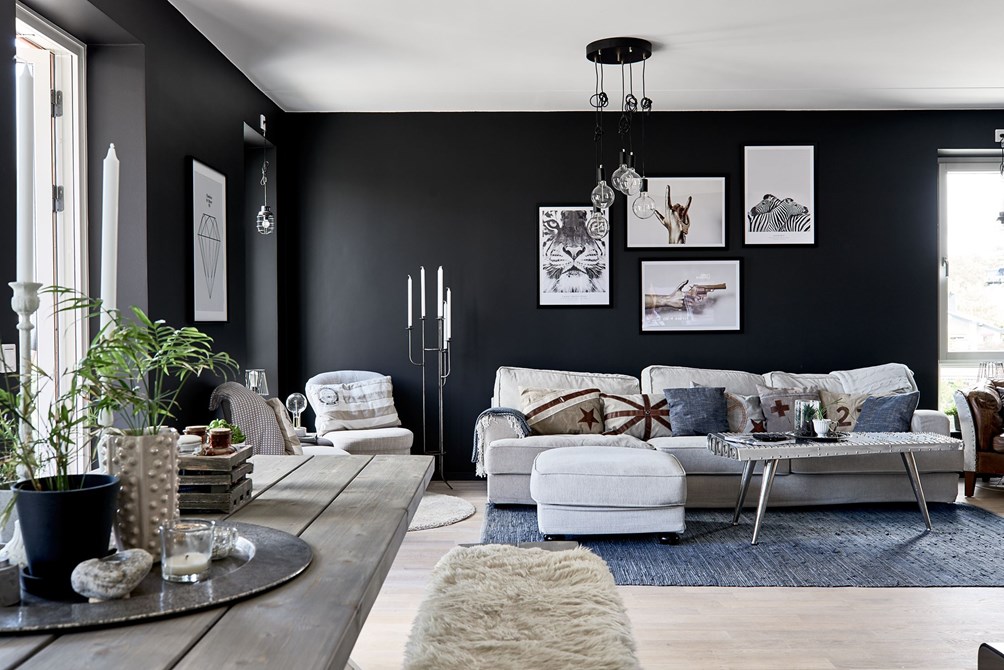 delikatissen salón negro paredes negras estilo escandinavo distribución abierta diseño interiores decoración interiores color negro pared blog decoración nórdica 