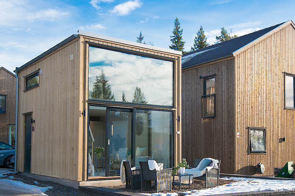 delikatissen Pequeña vivienda fuera de lo común distribución diáfana cottage construcciones modernas construccion casa cubo casa de vacaciones sueca Casa de madera arquitectura moderna 