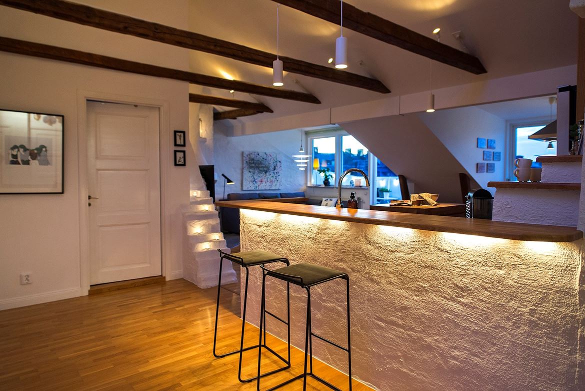 distribución abierta diseño terraza diseño interiores decoración nórdica decoración atico cocina con isla atico sueco Acogedor ático con terraza 