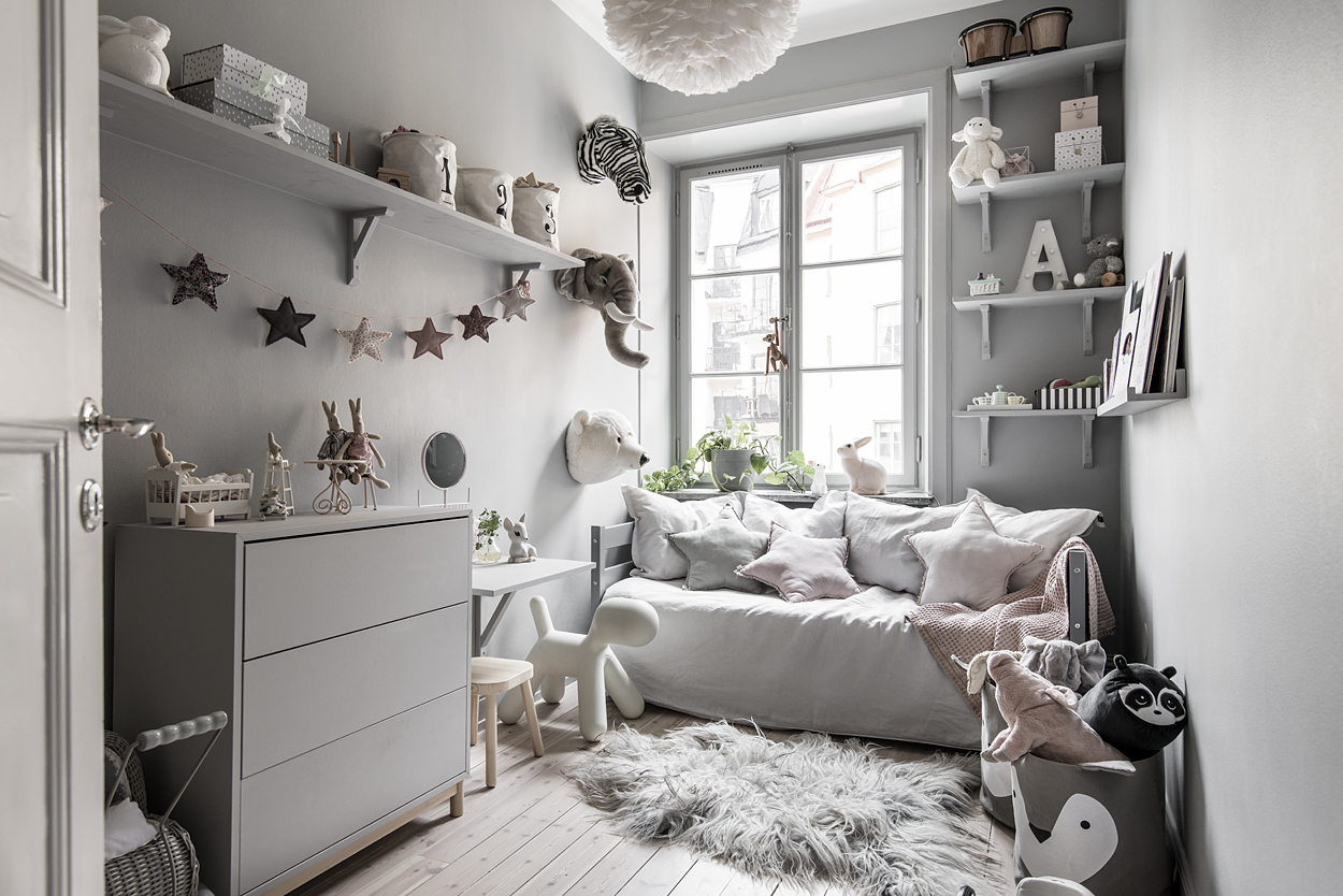 Habitación infantil nórdica en gris