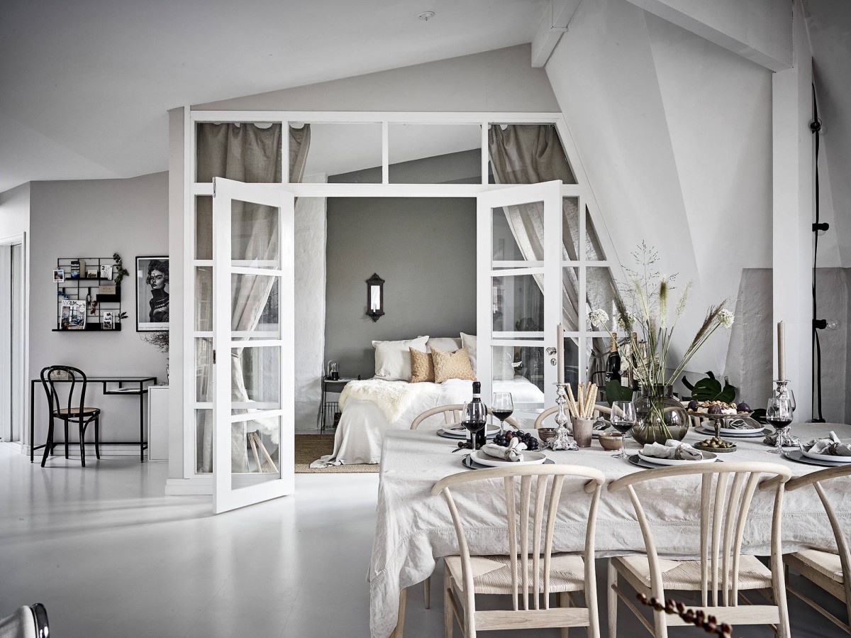 scandinavian penthaus pared de cristal estilo escandinavo distribución diáfana distribución abierta decoración blanca decoración áticos atico sueco 