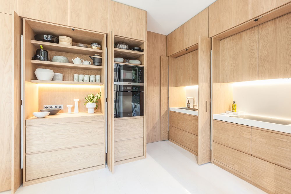 delikatissen piso barcelona estilo escandinavo barcelona espacio de almacenaje distribución abierta diseño español cocina madera 