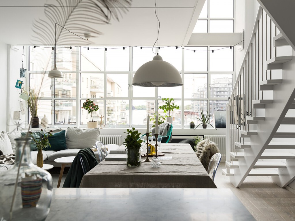 vigas de hierro ventanas con cuarterones blancos ventanales grandes loft industrial fábrica convertida en vivienda decoración loft 
