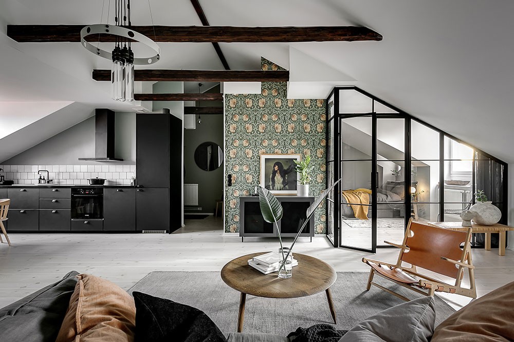 vigas en el techo small penthouse scandi penthouse scandi apartment pequeño ático pared de cristal open kitchen open concept nordic open penthouse ático scandinavo ático diáfano atico abierto 