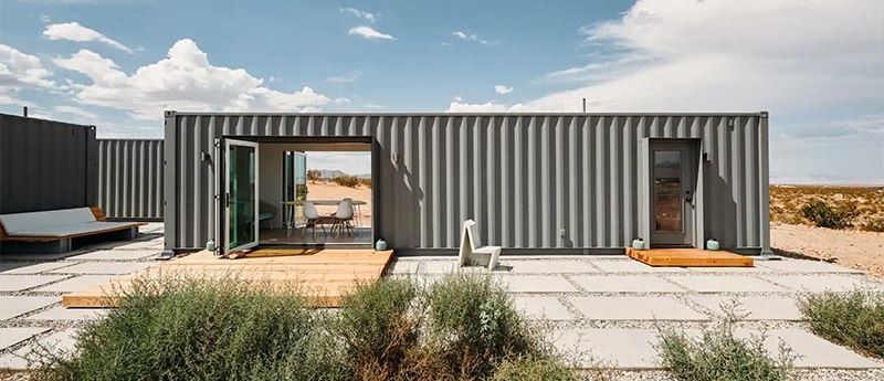 wood decks vanity area storage picture window modern shipping container house main bedroom living room kitchen Joshua Tree guest suite container color palette white casas recicladas casas modernas casa con contenedores casa con containers california bi-folding doors bathroom airbnb 