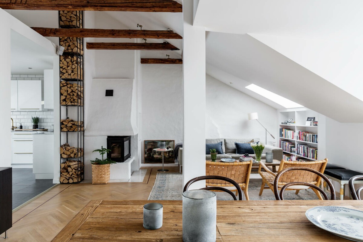 troncos en casa swedish penthouse scandinavian style scandinavian penthouse scandinavian fireplace scandinavian decor salón con chimenea nordic decor log shelf leña estantería para leña distribución de ático decoración atico como colocar troncos como colocar leña chimenea atico nórdico ático con chimenea almacenaje de leña 